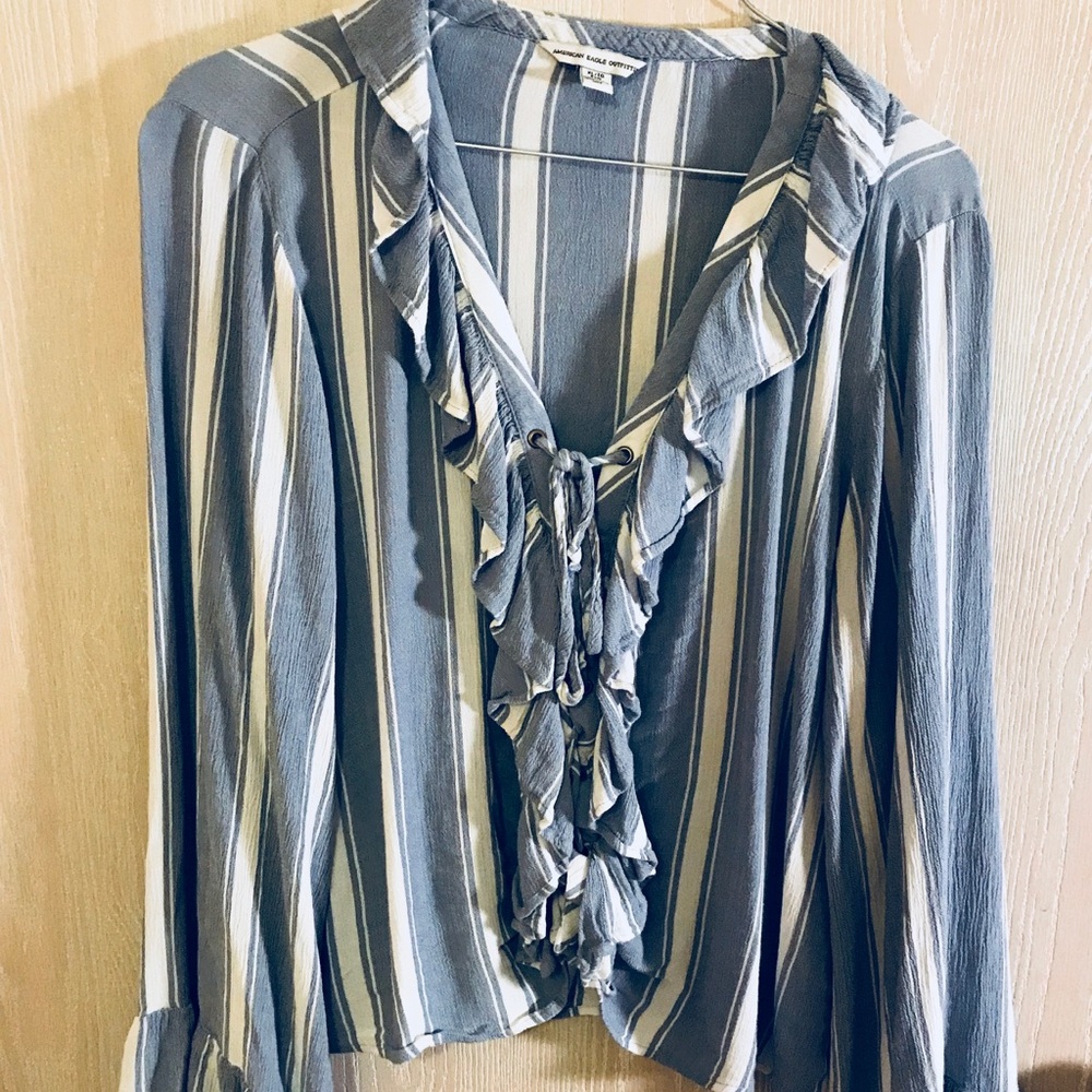 Long bell sleeve slightly cropped blouse